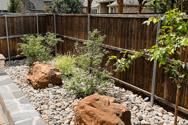 Landscaping installation project boulders